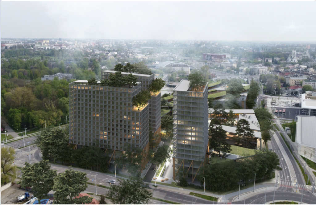 Dwa wieżowce otoczone drzewami.